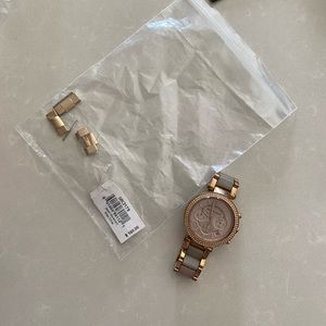 Rose gold Micheal khors watch